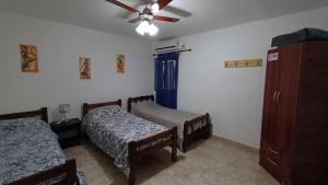 Ένα ή περισσότερα κρεβάτια σε δωμάτιο στο Apartamento Catamarca 9 de julio