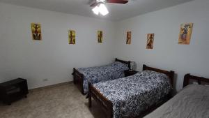 Ένα ή περισσότερα κρεβάτια σε δωμάτιο στο Apartamento Catamarca 9 de julio +1 φωτογραφίες