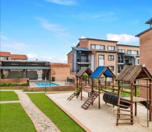 a playground with a slide at Prime Ridge in Midrand