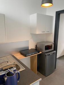 Dapur atau dapur kecil di Studio Cosy