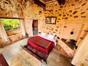 Ένα ή περισσότερα κρεβάτια σε δωμάτιο στο Raht Manmatha