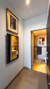 a bathroom with a sink and a mirror on the wall at Casa Buddha - Pool, Jacuzzi and private terrace in Cancún