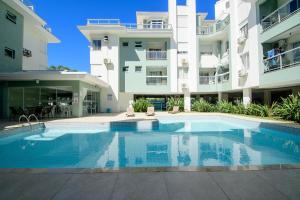 La pileta dentro o cerca de Apto com piscina e churrasqueira VS6418