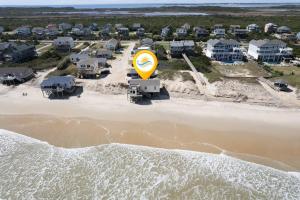 an aerial view of a beach with houses at 7144 - Dolphin Lookout ( formerly Sabah Vacations) in Wanchese