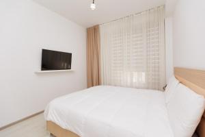 Φωτογραφία από το άλμπουμ του Modern Apartment in Chișinău Testimetianu στο Kισινάου