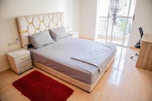 Giường trong phòng chung tại Appartement Damas au centre de Kénitra