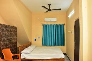 Ένα ή περισσότερα κρεβάτια σε δωμάτιο στο PPRK Rooms