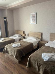 Postel nebo postele na pokoji v ubytování Apart Hotel Four Rooms