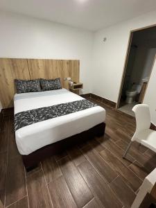 Postel nebo postele na pokoji v ubytování Aw Hotel Ariston Embassy