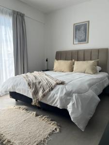 Ένα ή περισσότερα κρεβάτια σε δωμάτιο στο Departamento Aeropuerto Ezeiza