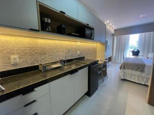 Η κουζίνα ή μικρή κουζίνα στο ORA Beach Residence - Flat Porto de Galinhas