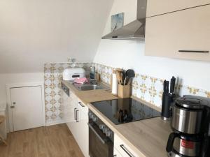 Η κουζίνα ή μικρή κουζίνα στο One-bedroom apartment