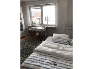 Ένα ή περισσότερα κρεβάτια σε δωμάτιο στο One-bedroom apartment