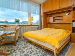 Ένα ή περισσότερα κρεβάτια σε δωμάτιο στο Holiday apartment in Westerland with parking