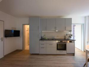 Dapur atau dapur kecil di Holiday apartment Ahrenshoop +10 gambar
