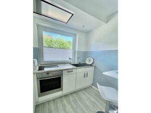 Køkken eller tekøkken på Holiday home Bellaeins + 26 billeder