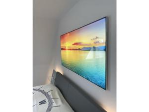 Et tv og/eller underholdning på Holiday home Bellaeins