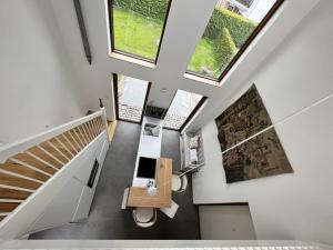 TV a/nebo společenská místnost v ubytování House on the River Werder