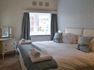 En eller flere senge i et værelse på Esplanade Crescent