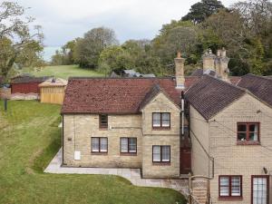 an aerial view of a house with a yard at The Coach House in Wootton Bridge