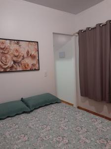 Ένα ή περισσότερα κρεβάτια σε δωμάτιο στο Pousada Baden Baden