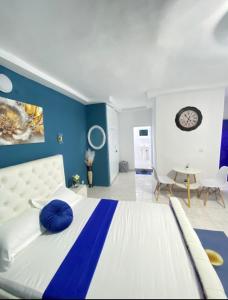 Ένα ή περισσότερα κρεβάτια σε δωμάτιο στο Home Garden