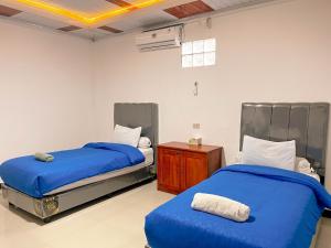 Postel nebo postele na pokoji v ubytování Raffiel Nias + 64 fotografií