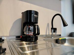 Kuchyň nebo kuchyňský kout v ubytování Estudio cable plaza confort y ubicación ideal