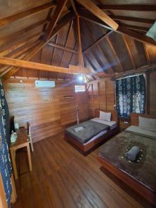 En eller flere senge i et værelse på Westwood Bungalow + 38 billeder