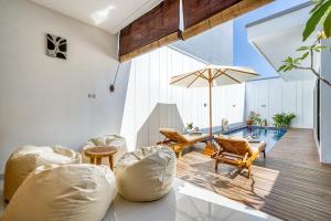 Χώρος καθιστικού στο Cozy 2-BR villa in Canggu with a spacious pool