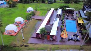 an aerial view of a house with a gazebo and a pool at Yellow House in Hengchun