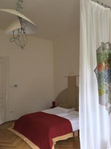 Uma cama ou camas num quarto em Wohnzimmer