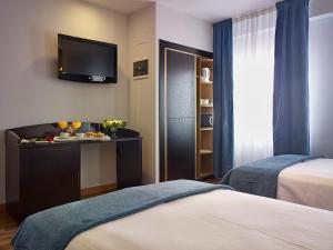 Letto o letti in una camera di Hotel 40 Nudos