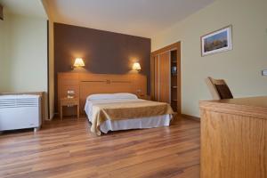 Letto o letti in una camera di Hotel 40 Nudos