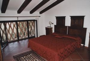 Un pat sau paturi într-o cameră la Agriturismo Kogoj