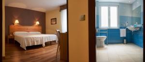 Letto o letti in una camera di Hotel 40 Nudos