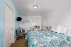 Postel nebo postele na pokoji v ubytování 2 Modern Combined Family Studio Apartments + 18 fotografií