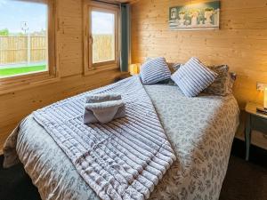 Postel nebo postele na pokoji v ubytování The Homestead Compact