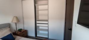 Ένα ή περισσότερα κρεβάτια σε δωμάτιο στο Apartamento moderno a 10 minutos del Aeropuerto