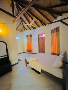 Postel nebo postele na pokoji v ubytování MALWATHTHA MOUNT VILLA KANDY