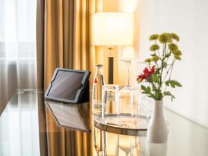 TV a/nebo společenská místnost v ubytování Hotel an der Oper