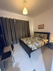 Postel nebo postele na pokoji v ubytování Emira Haven + 2 fotografie