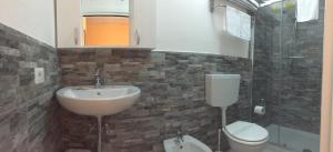 Koupelna v ubytování Hotel Aline