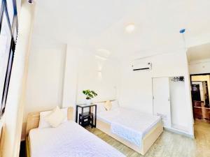 Ένα ή περισσότερα κρεβάτια σε δωμάτιο στο New Sunny Hotel +4 φωτογραφίες