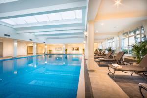 a swimming pool in a house with at Hotel Bellevue - Liburnia in Opatija