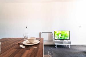 TV a/nebo společenská místnost v ubytování Bright & Modern 1 Bed Apartment in Blackburn Centre