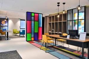 TV a/nebo společenská místnost v ubytování Mercure Paris Gare de l'Est