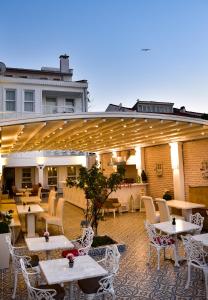 A patio or other outdoor area at Büyükada Port Hotel