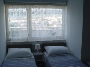 Posteľ alebo postele v izbe v ubytovaní Apartment Maka