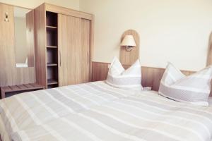 Postel nebo postele na pokoji v ubytování Ferienhaus Friedrichsmilde